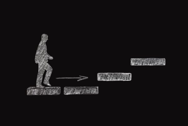 Chalk board figure walking on steps